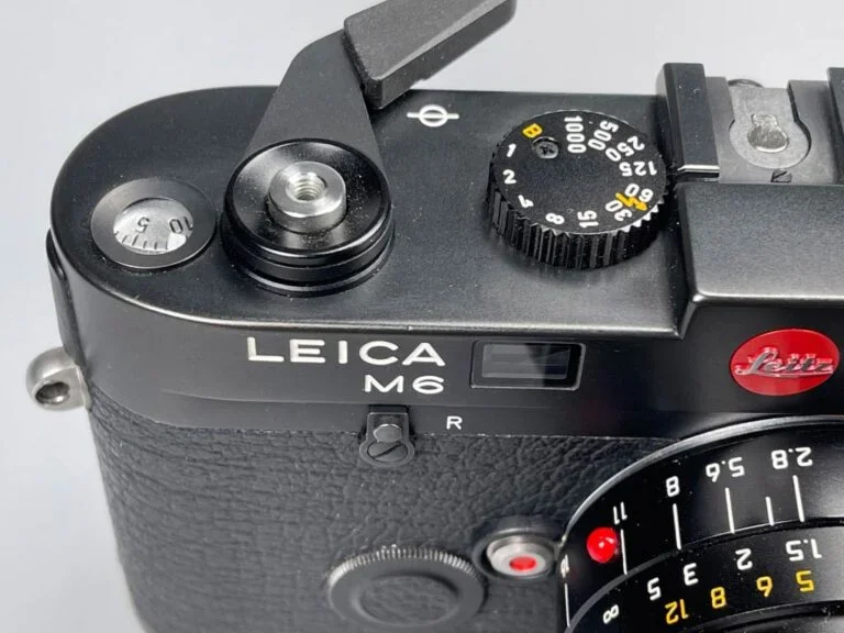 Leica M6 Verschlusszeitenrad mit Filmtransporthebel und Bildzählwerk